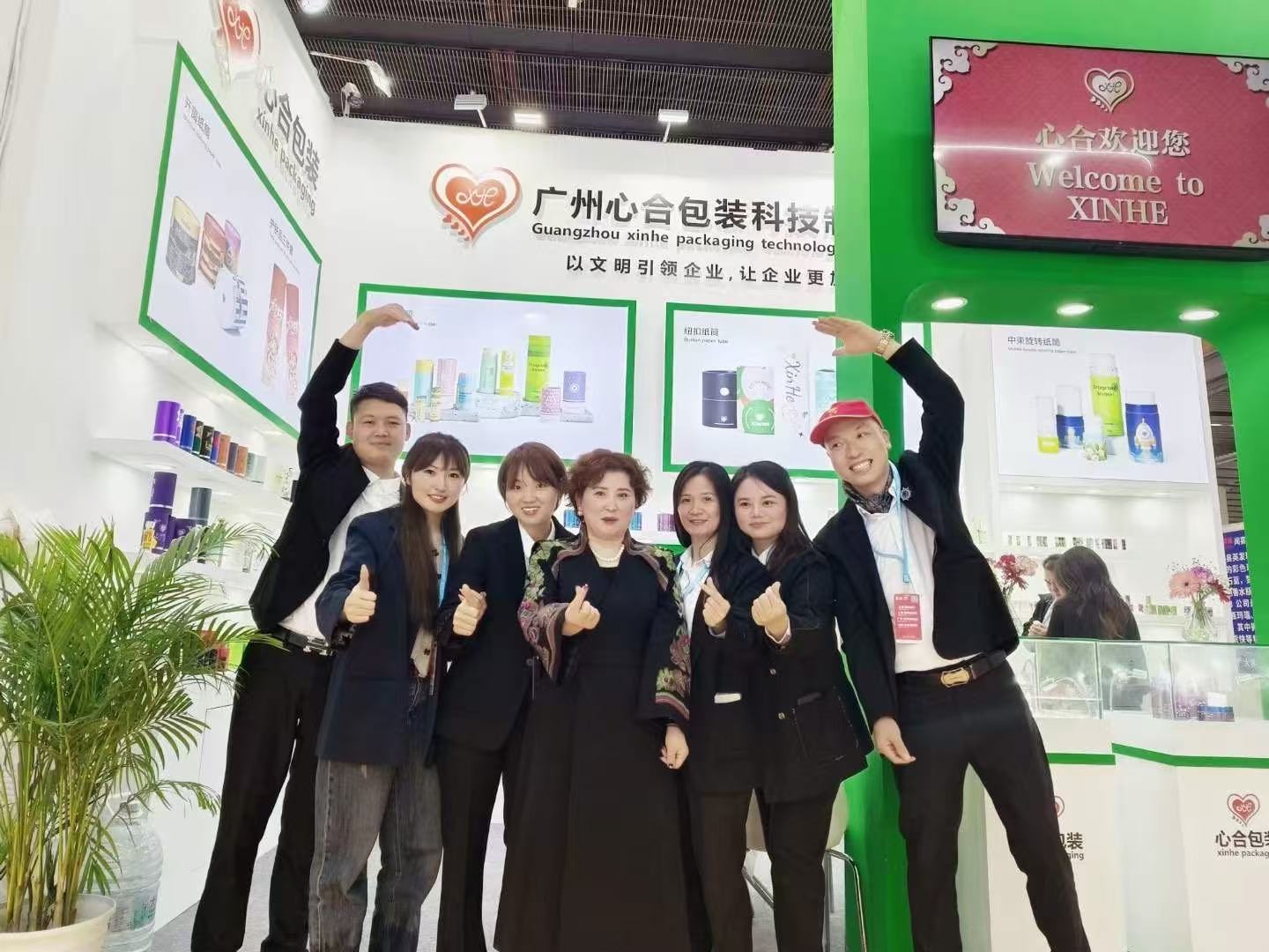 XinHe sales and project consulting team at a packaging trade show